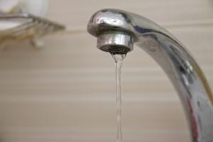 Water-Bill-Savings-Old-Faucet